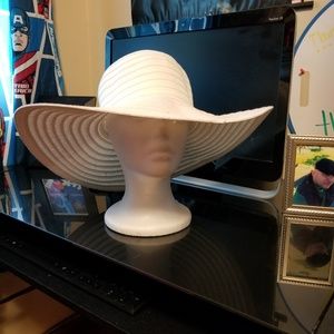 Big floppy white sun hat